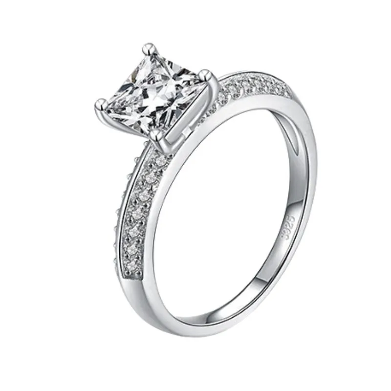 Nimy ring archive photograph of a silver-tone ring with a raised central stone